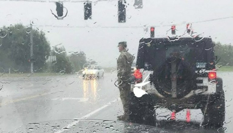 U.S. Soldier Snapped Standing To Attention In The Pouring Rain – Let’s Pay Him Tribute